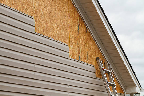 Professional Emergency Siding Repair technician working in Columbus, NC